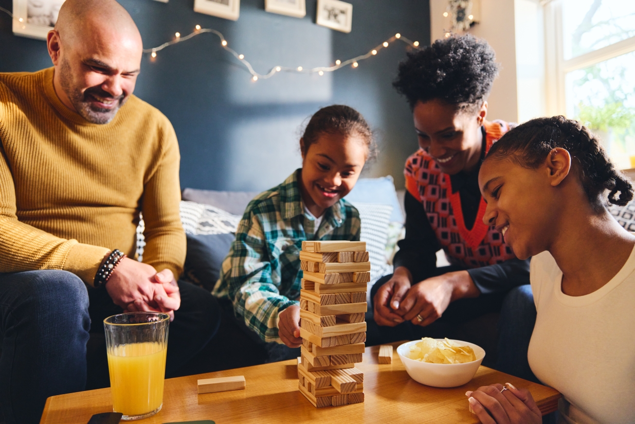 Family playing Jenga