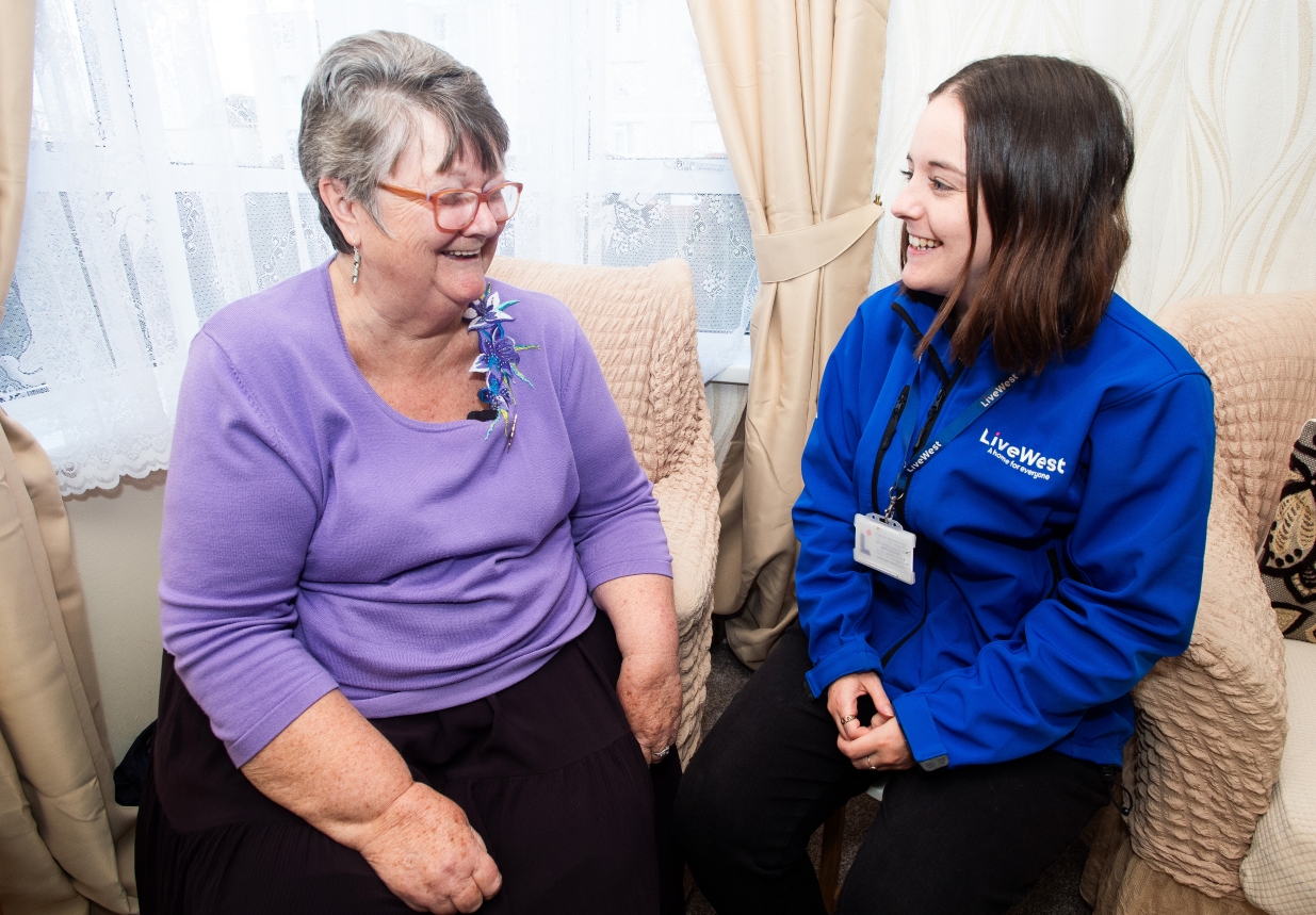 Jenny smiling with one of our LiveWest colleagues.
