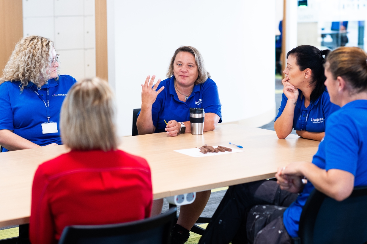 Our colleagues discussing at the forum.