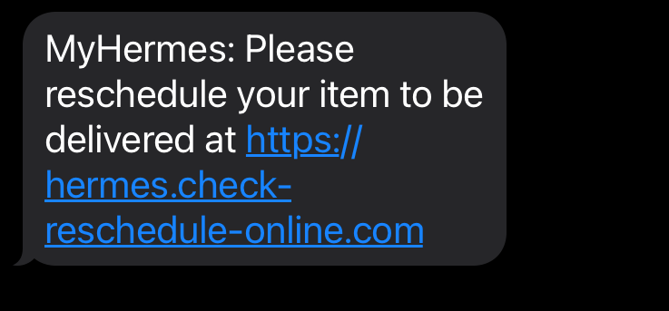 A scam text asking the recipient to click a link to rearrange a parcel delivery