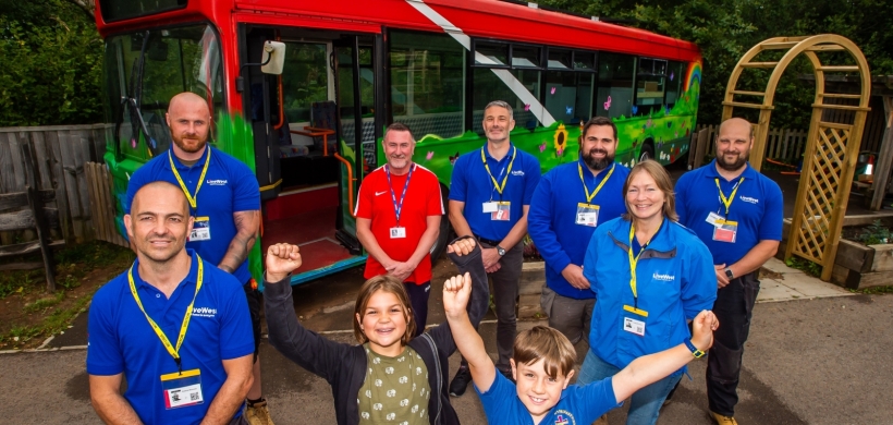 Volunteers with the upcycled bus