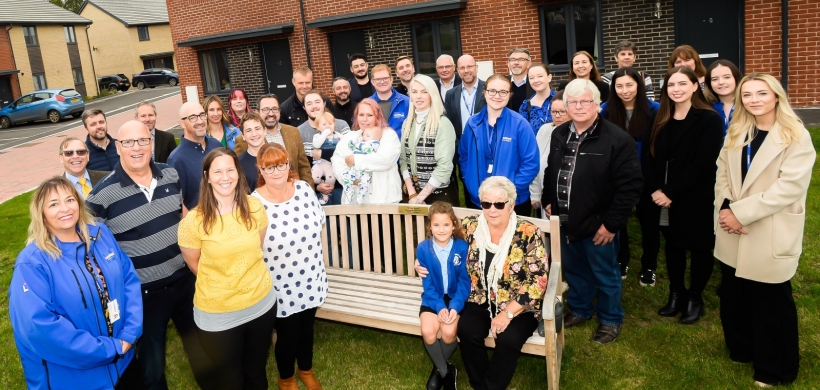 Councillor Paul Whaites’ family and LiveWest staff on the bench dedicated to councillor Whaites