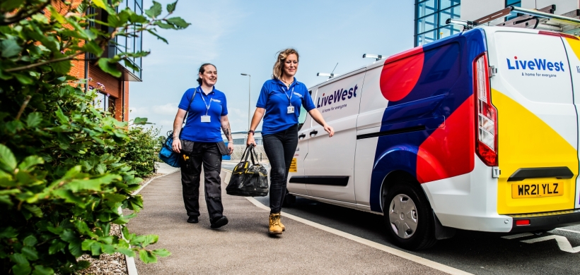 LiveWest colleagues by a LiveWest van. 