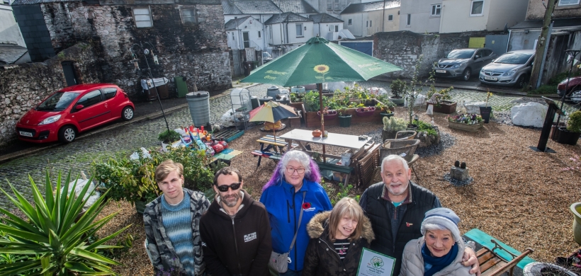 The group of volunteers at the community garden.