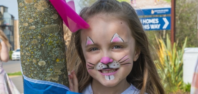 child with face paint