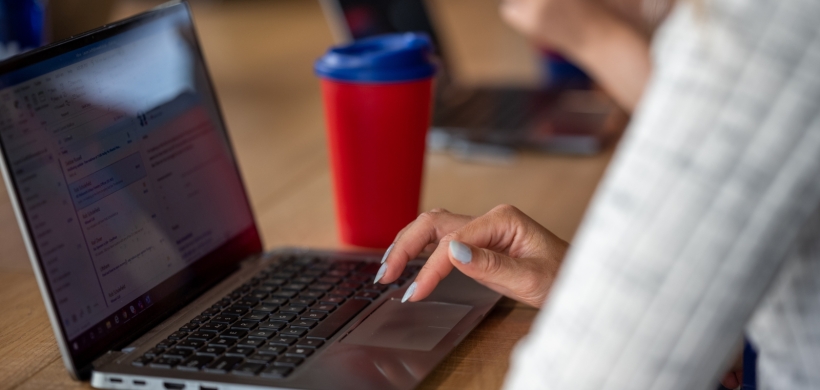 An image of someone using a laptop. 