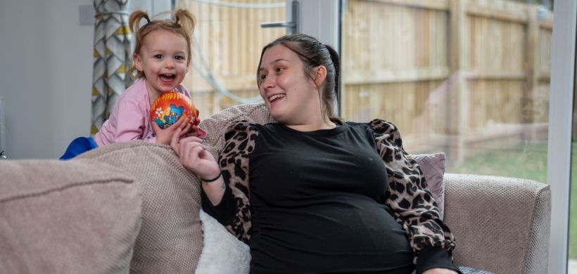 Shannon and Ava inside their new home