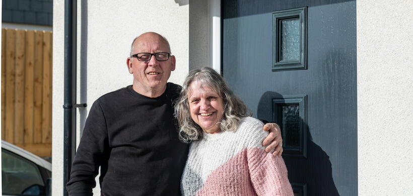 Kev and Ann outside their new home in Bodmin. 