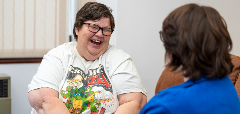 LiveWest customer laughing with colleague