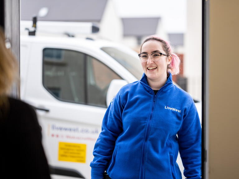 LiveWest colleague arriving at a house to carry out a repair. 