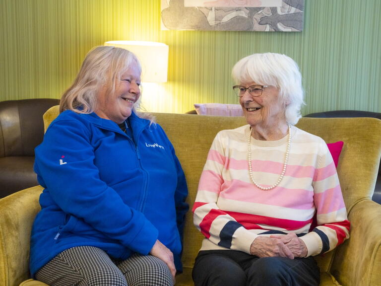 LiveWest colleague and customer chatting and smiling