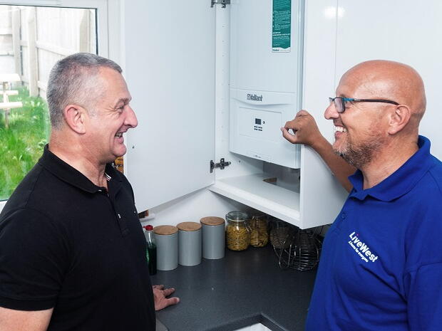 Mark Lamble (left) in his home at Applegate Park.