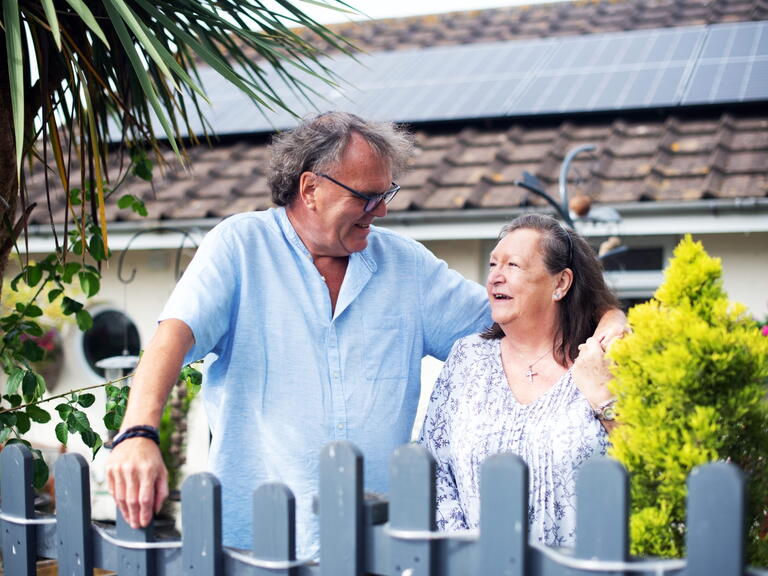 Peter and Anita outside their home in Devon.