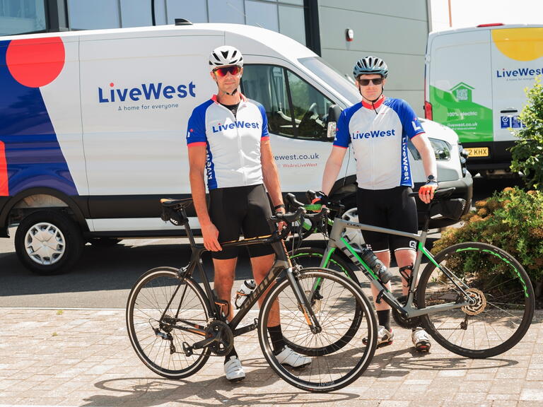 Two LiveWest colleagues ready for a charity bike ride.