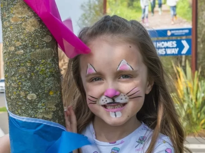 child with face paint