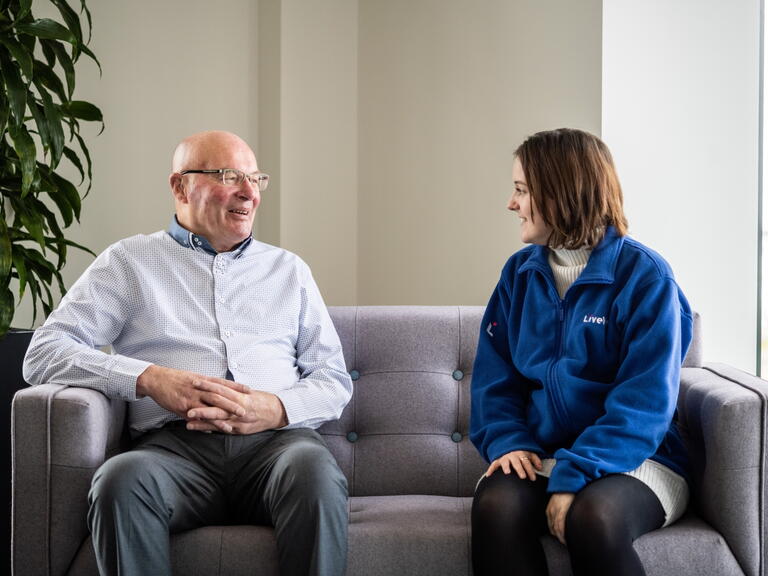 Our Vice Chair of InFocus (left) smiling next to one of our colleagues.