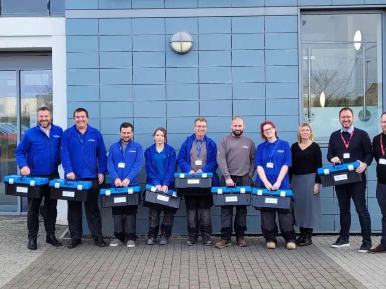James handing over toolkits to our apprentices.