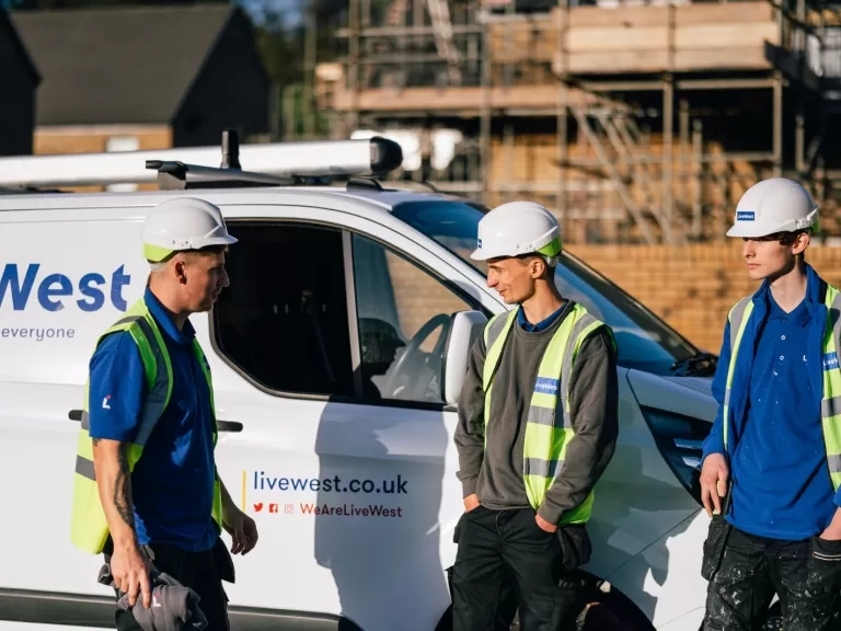Toby Luce with two apprentices standing by a LiveWest
