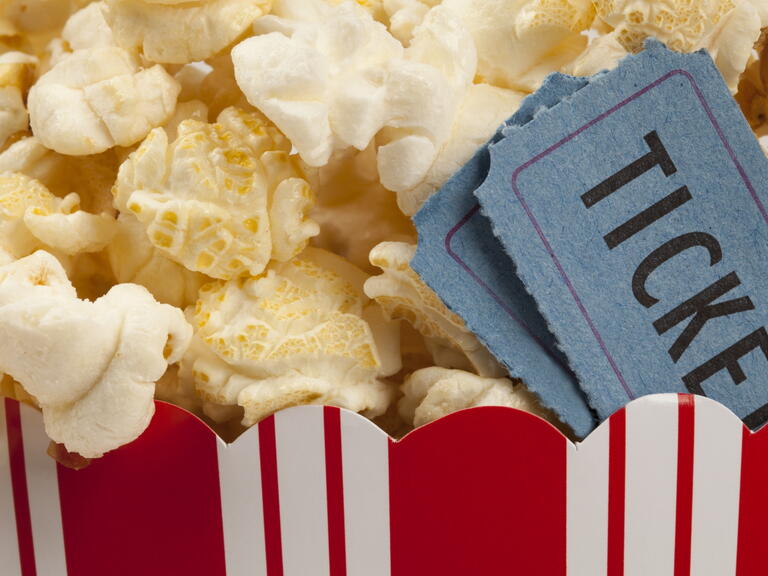 Popcorn and tickets. Image by Shutterstock.