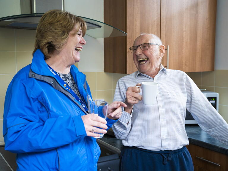 Customer and Colleague drinking tea