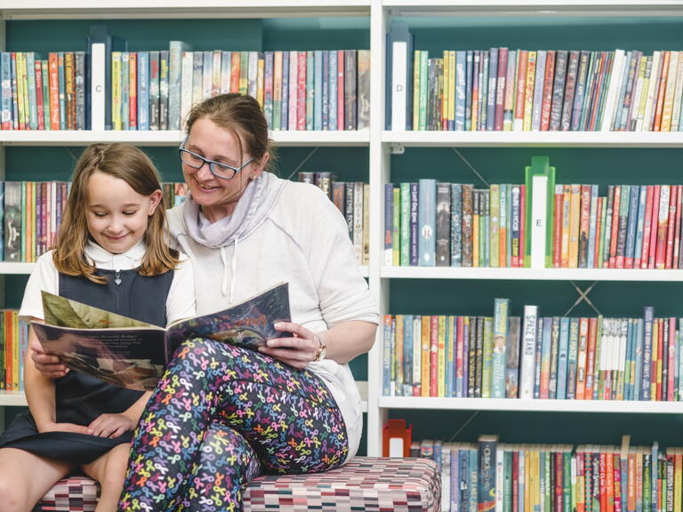 Sue and her daughter Olivia at St Budeaux's community library.