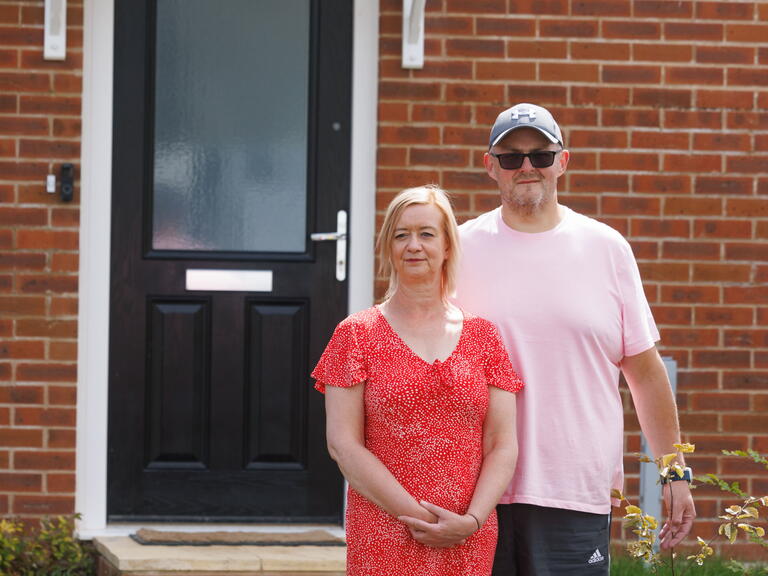 Cressie and Richard outside their new home in Somerton.
