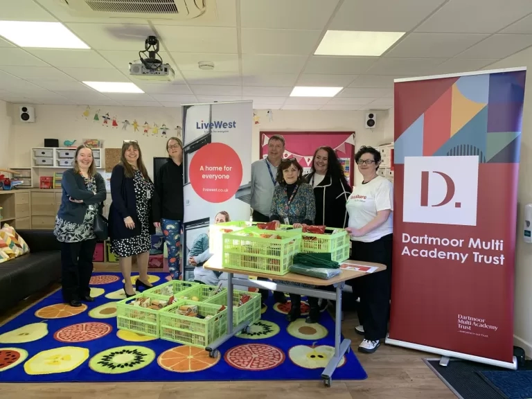 Green box project launch with partners and volunteers.