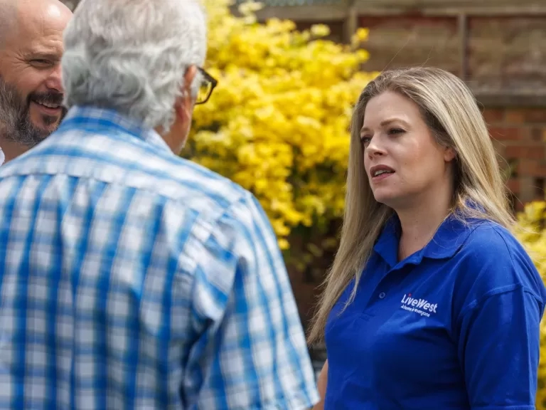 Colleague talking with customers