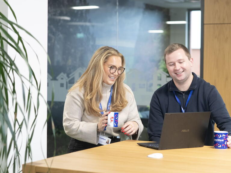 Colleagues laughing 