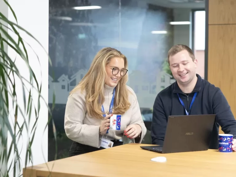 Colleagues laughing 
