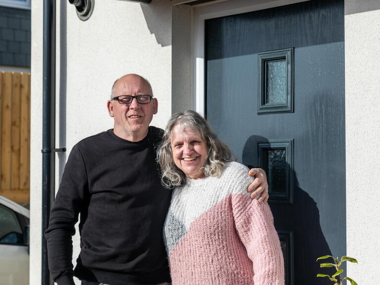 Kev and Ann outside their new home in Bodmin. 