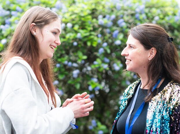 Saskia chatting to a colleague at the foyer.