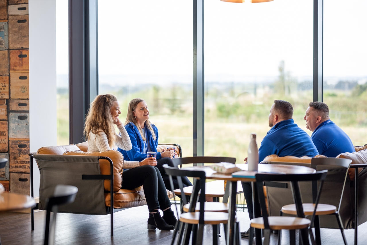 A group of colleagues having a conversation