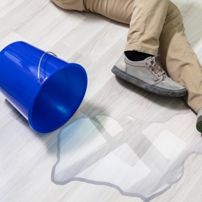 Spilled water bucket causing fall