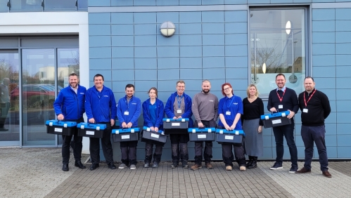 James handing over toolkits to our apprentices.