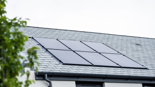 Image of solar panels on the roof of a house. 