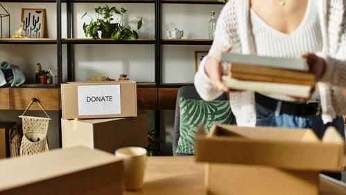 Woman organising boxes in a home