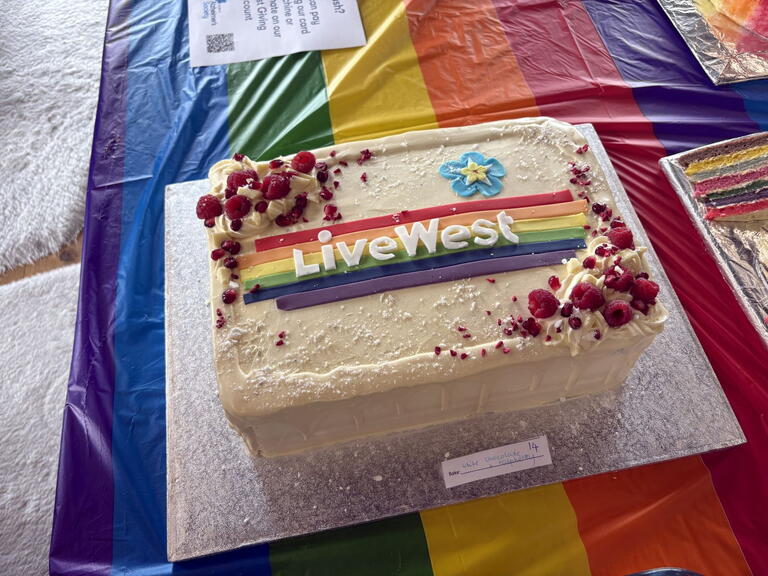 Pride cake with LiveWest logo